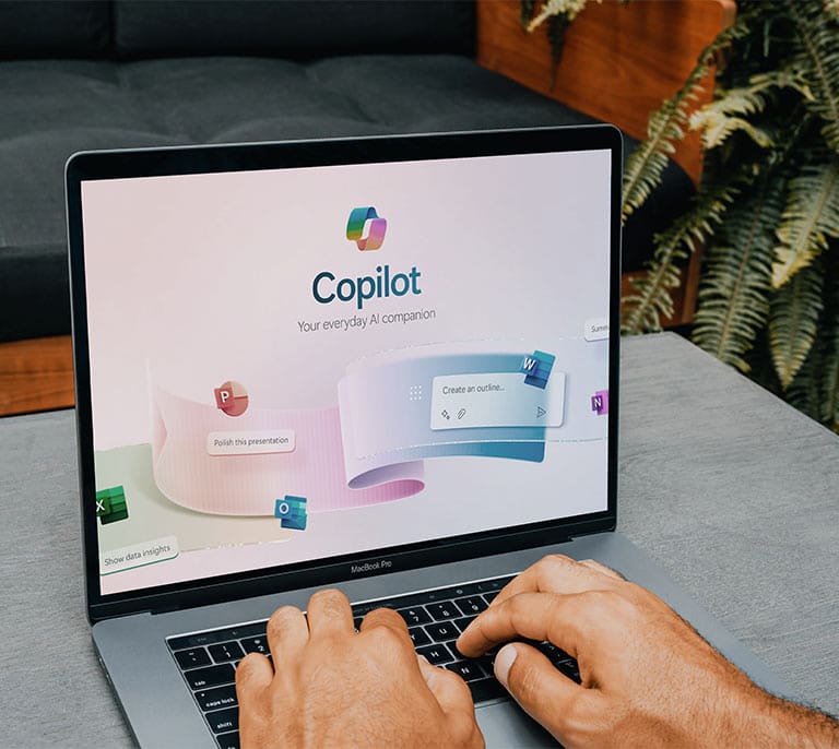 Microsoft Copilot displayed on a laptop screen providing AI-powered assistance, automation and productivity support.