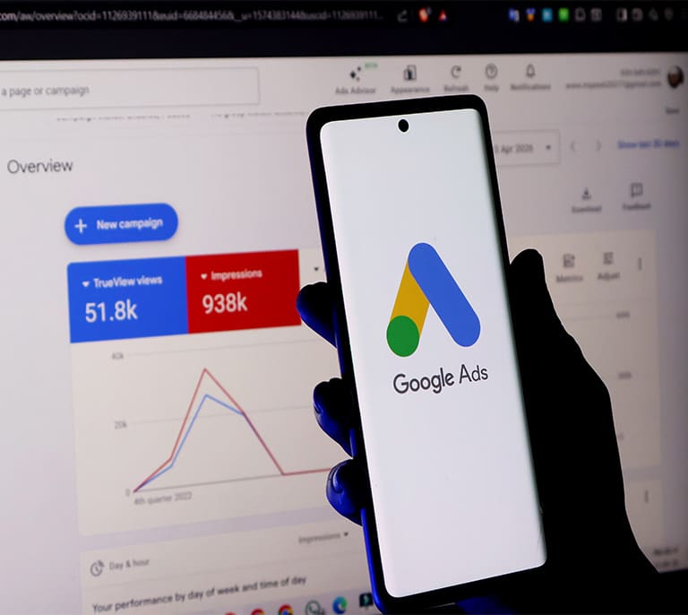 Google Ads dashboard and campaign performance metrics displayed on a mobile device for paid search advertising management.