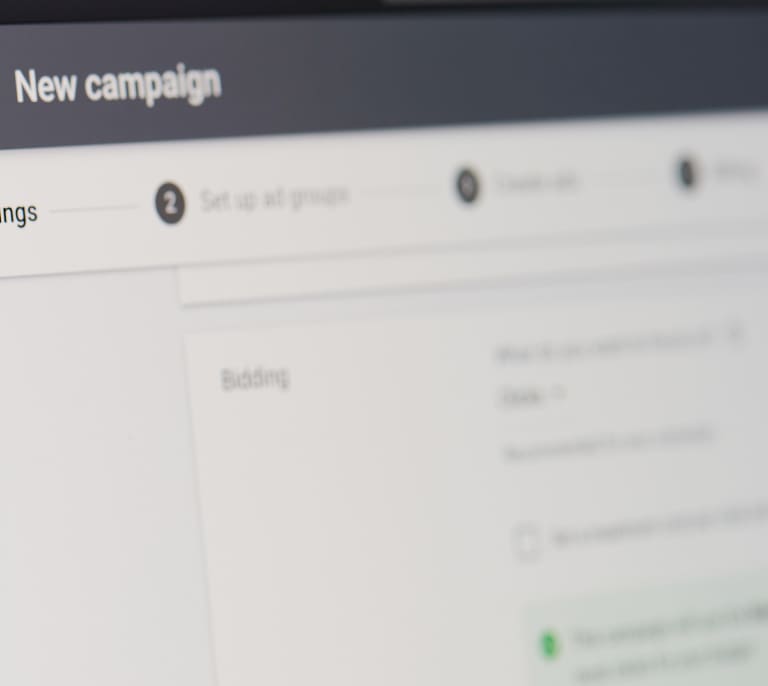 Google Ads dashboard displaying search campaign performance metrics, impressions and campaign management tools.