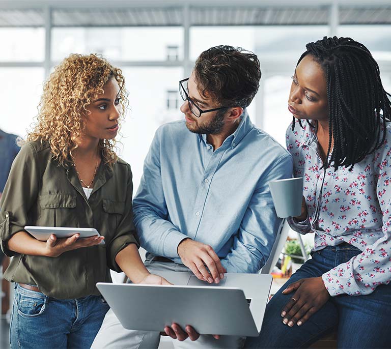 Marketing professional reviewing sales and marketing content used for campaigns, customer communications and promotional activity.